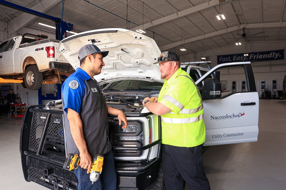 Tipton Ford team speaks with a commercial fleet client.